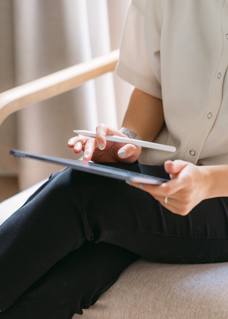 Kathy taking notes on her iPad